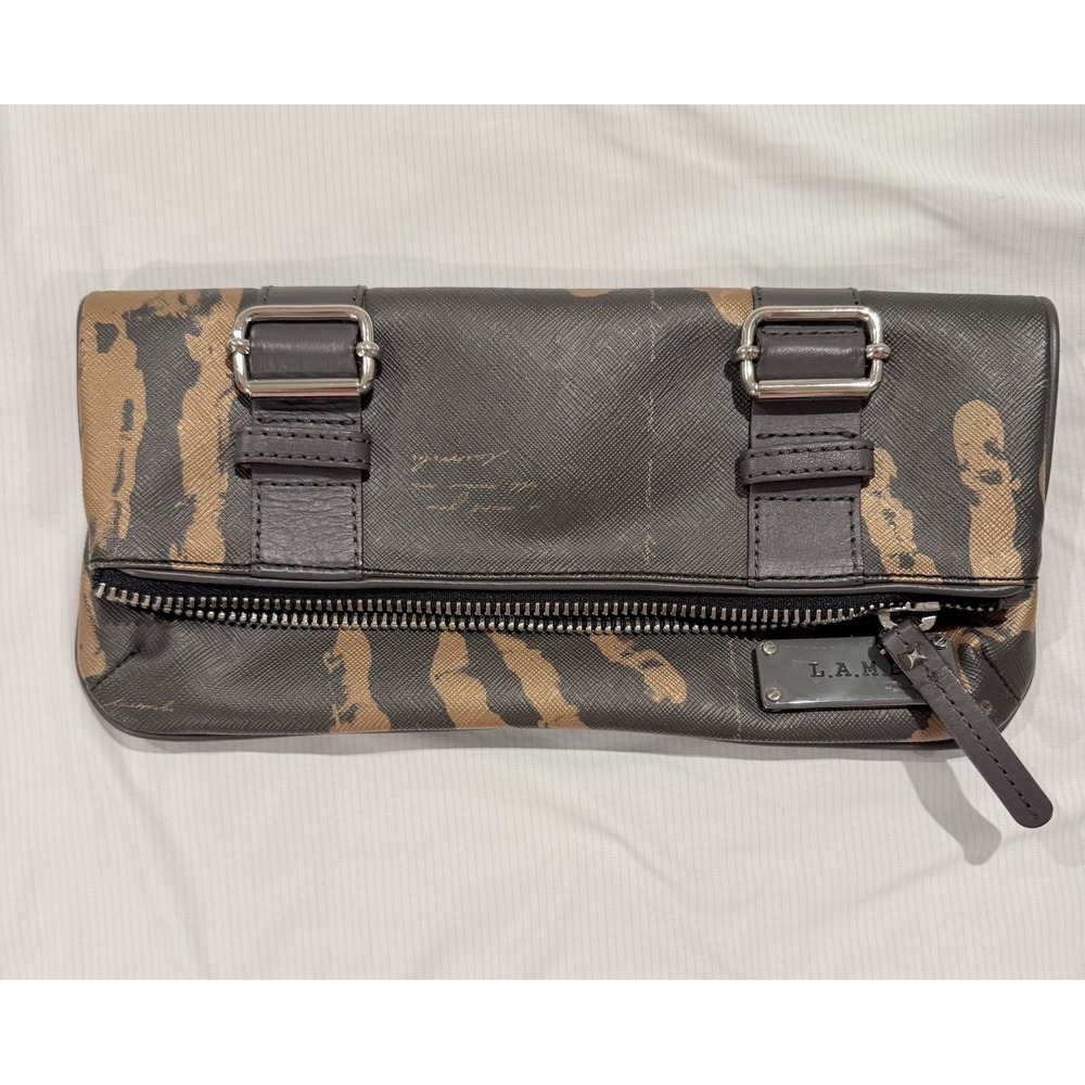 L.A.M.B. by Gwen Stefani clutch features a black and brown Camouflage Print